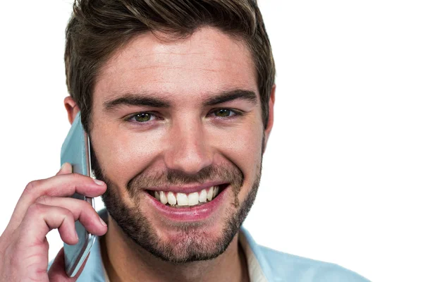 Lächelnder Mann am Telefon — Stockfoto