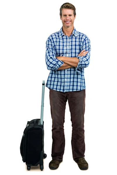 Smiling man with luggage — Stock Photo, Image