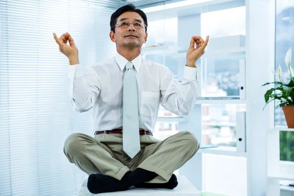 Peaceful asian businessman relaxing — Stock Photo, Image