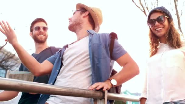 Smiling hipster friends with map — Stok Video