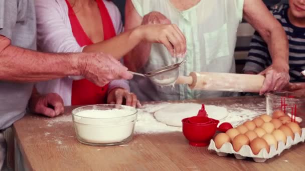 Happy family cooking biscuits together — Stock Video