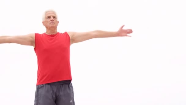 Mature man doing yoga — Stock Video