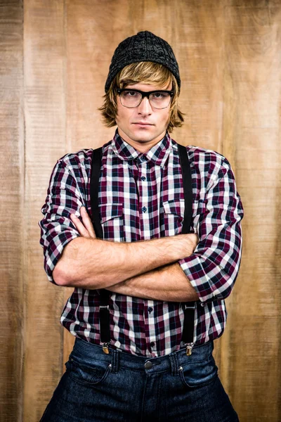 Serious blond hipster crossing arms — Stock Photo, Image