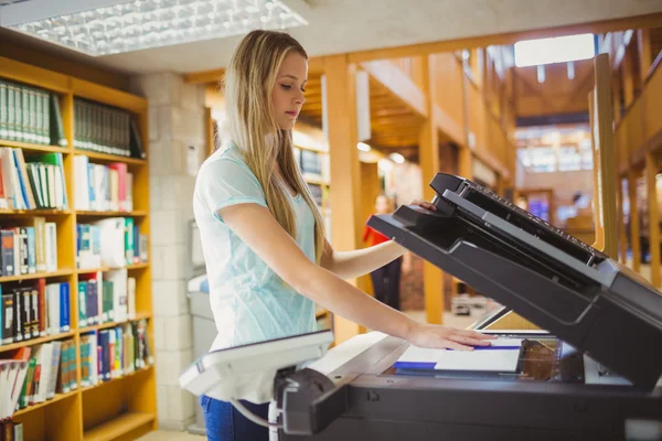 Blonde student making copy — Φωτογραφία Αρχείου