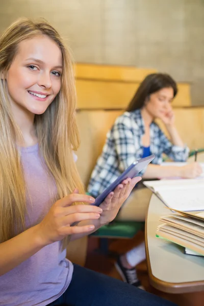 Blonde student using tablet — 스톡 사진