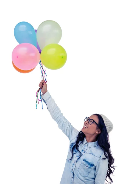 Азиатка с разноцветными воздушными шарами — стоковое фото