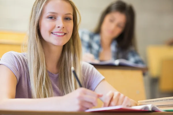 Students sitting beside each other — Stock Photo, Image