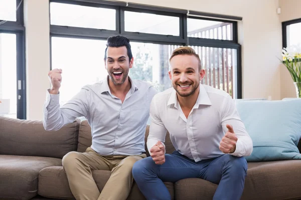 Hombre guapo celebrando la victoria — Foto de Stock