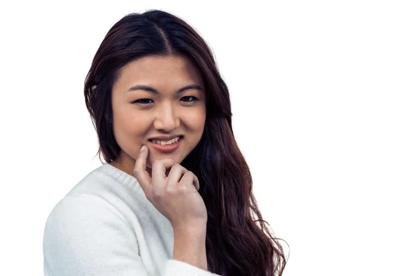 Asian woman with hand on chin — Stock Photo, Image