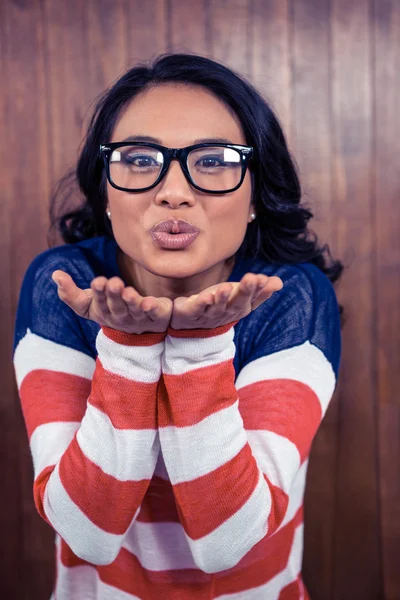 Asian woman blowing kiss — Stock Photo, Image