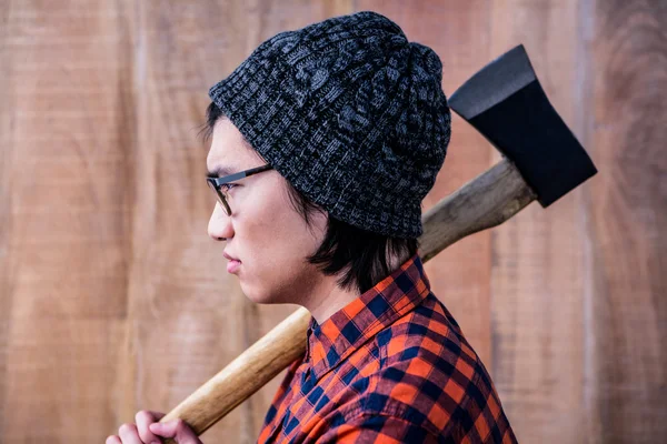 Hipster holding a axe — Stock Photo, Image