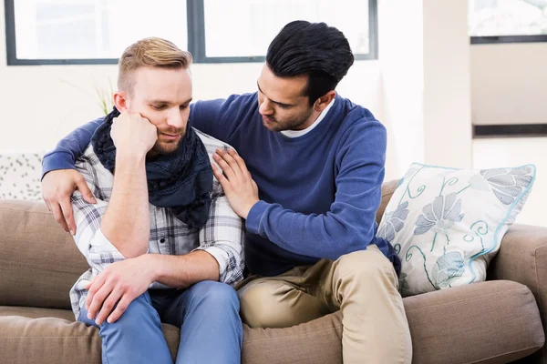 Gay pareja sulking cada otro — Foto de stock #98093796 © Wavebreakmedia