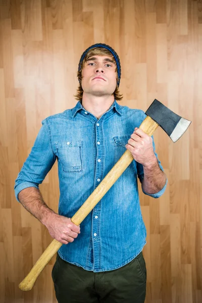 Hipster standing with axe — Stock Photo, Image