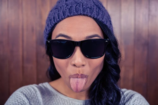 Asian woman sticking out her tongue — Stock Photo, Image