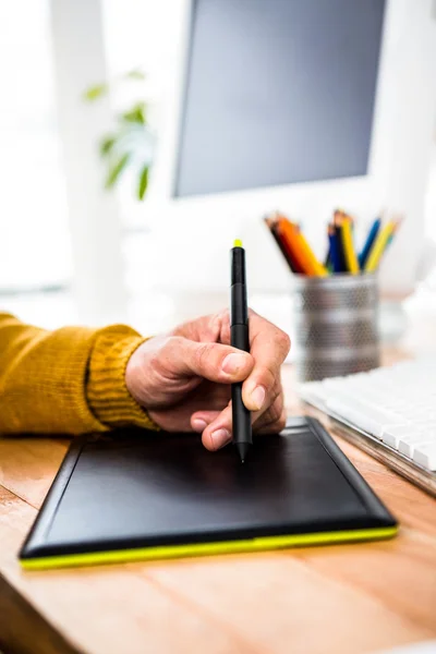 Businessman using tablet graphic — Stock Photo, Image