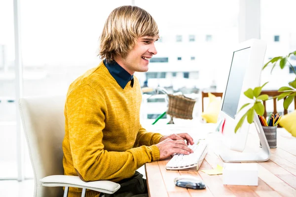Hipster businessman using computer — Stock Photo, Image