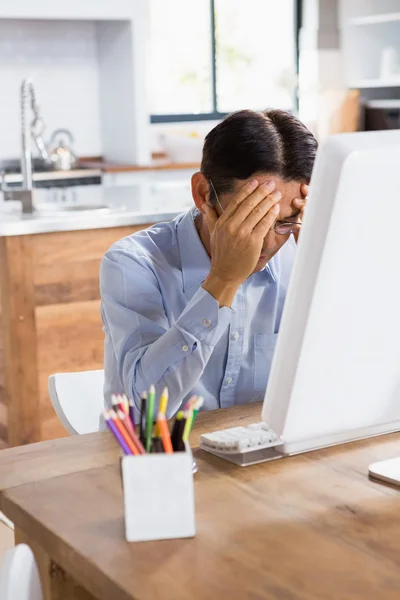 Suffering man with hands on face — Stock Photo, Image