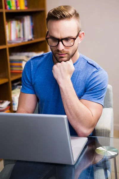 Serious designer working on computer — Stock Photo, Image