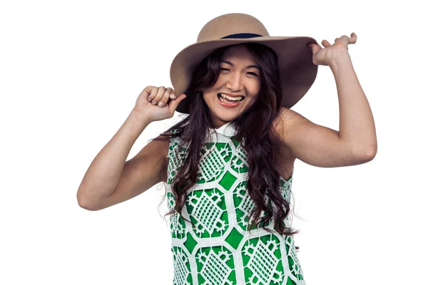 Happy Asian woman wearing hat — Stock Photo, Image