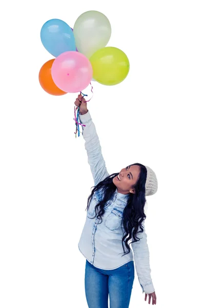 Asian woman holding colorful balloons — Stock Photo, Image