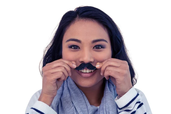 Asian woman with fake mustache posing — Stock Photo, Image