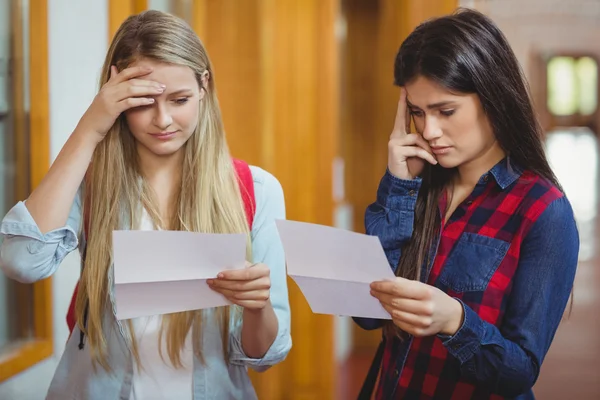Anxious students looking at results — Stock Photo, Image