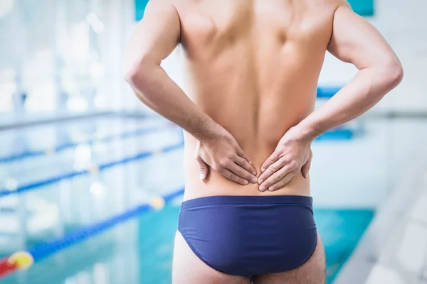 Apto homem com dor nas costas — Fotografia de Stock