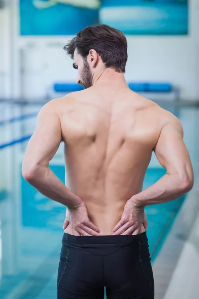 Fit man having back pain — Stock Photo, Image