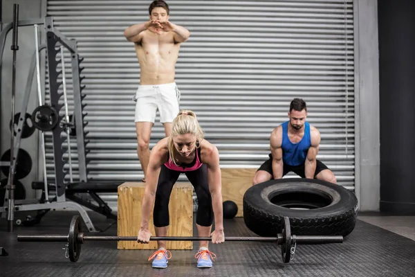 Fit pessoas fazendo exercícios — Fotografia de Stock