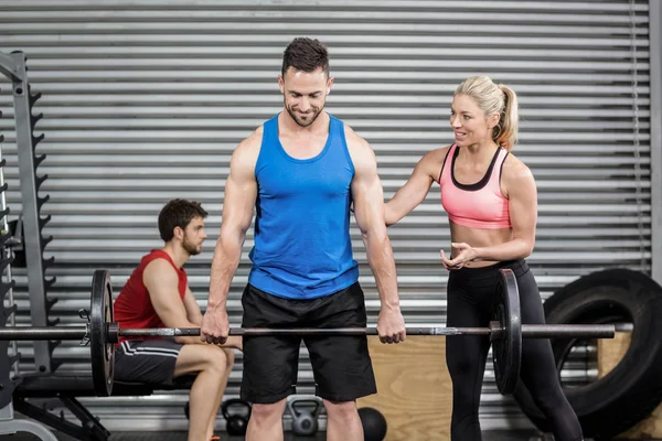 Fit people doing exercises — Stock Photo, Image