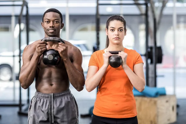 Atletische man en vrouw uit te werken — Stockfoto