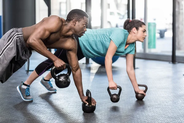 Athlétisme homme et femme travaillant sur — Photo