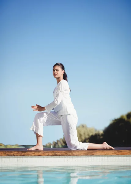 Calm brunette doing yoga — Stock Photo, Image