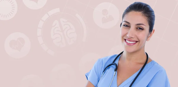 Kvinnliga läkare mot pastell blå — Stockfoto