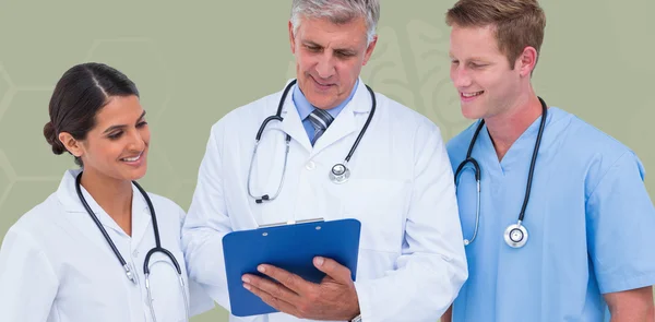 Doctor working with colleagues — Stock Photo, Image
