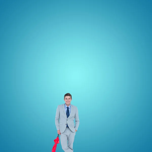 Lachende zakenman met paraplu — Stockfoto
