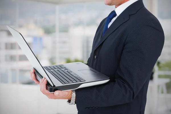 Businessman with watch using tablet pc — Stock Photo, Image