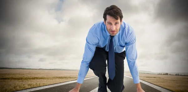 Uomo d'affari concentrato pronto a gareggiare — Foto Stock