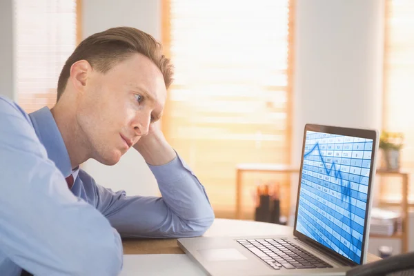 Businessman looking at laptop — Stock Photo, Image