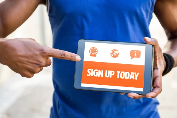 Man pointing at screen of digital tablet — Stock Photo, Image