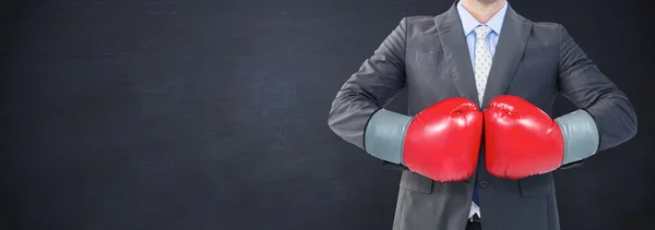 Businessman with boxing gloves — Stock Photo, Image