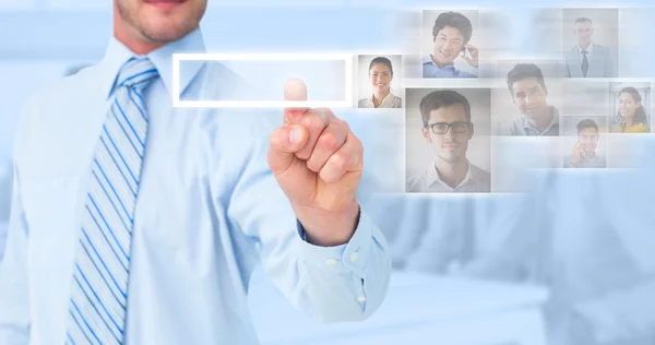 Imagen compuesta del hombre de negocios en camisa señalando con el dedo — Foto de Stock