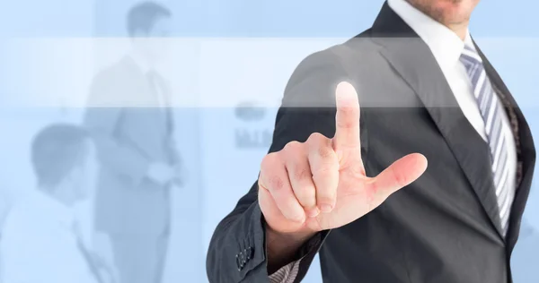 Businessman pointing with his finger — Stock Photo, Image