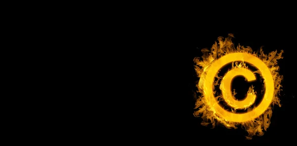 Copywrite logo v ohni — Stock fotografie