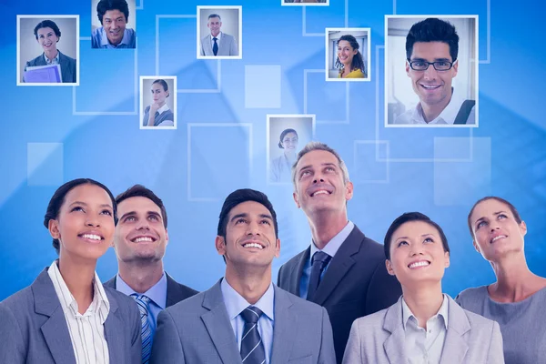 Business people looking up — Stock Photo, Image