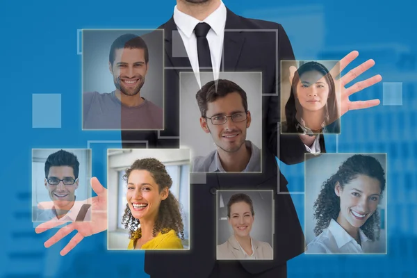 Businessman standing with hands spread out — Stock Photo, Image