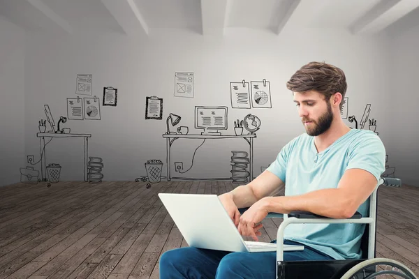 Man in wheelchair using computer — Stock Photo, Image