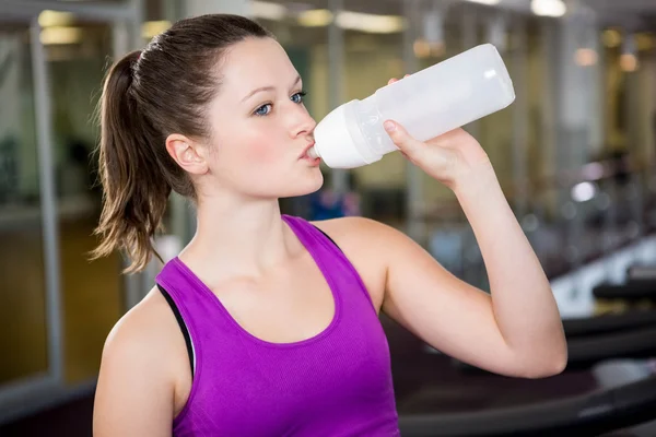 Brunette drinking water — Stock Photo, Image