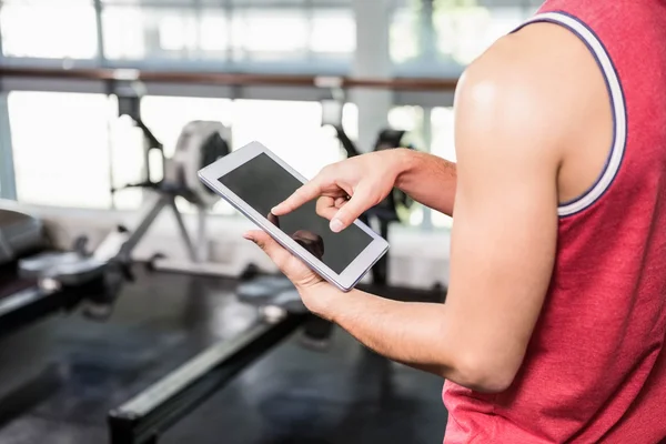 Mid section of man using tablet — Stock Photo, Image