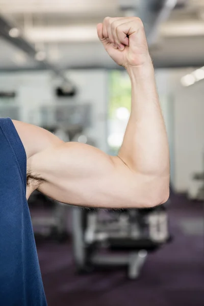 Close up of man showing biceps — Stock Photo, Image